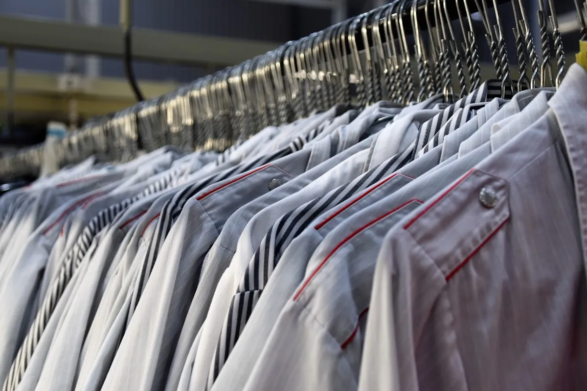 A rail of freshly pressed shirts